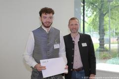 Benedict Hilaire und Dr. Andreas Brandl (re.)